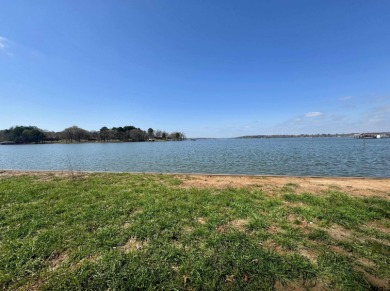 Beautiful waterfront lot in a lake community waiting for you to - Lake Lot For Sale in Pittsburg, Texas