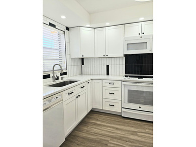 55+ golf course community. This light-filled home features a - photo 1