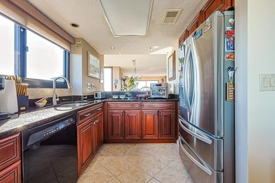 Welcome to Unit 901 at 311 69th Ave N, a unique, spacious