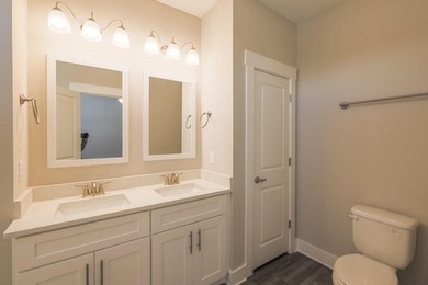 This Savannah floor plan features 3 bedrooms, 2.5 baths, and a - photo 5