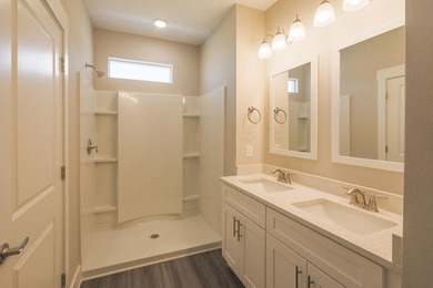 This Savannah floor plan features 3 bedrooms, 2.5 baths, and a - photo 6