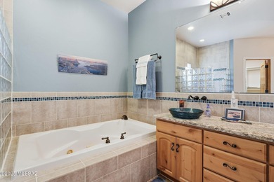 Tucked at the end of a winding private road, this desert