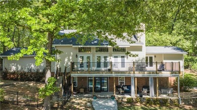 Experience refined lake living in this exceptional 5-bedroom, 3 - photo 14
