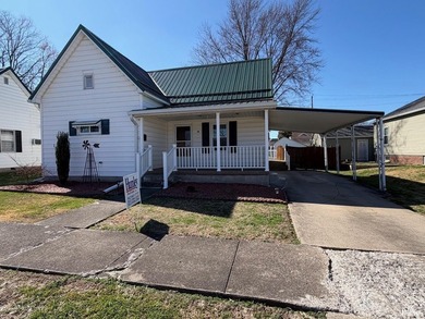 This charming 2-bedroom, 1-bath home has been lovingly