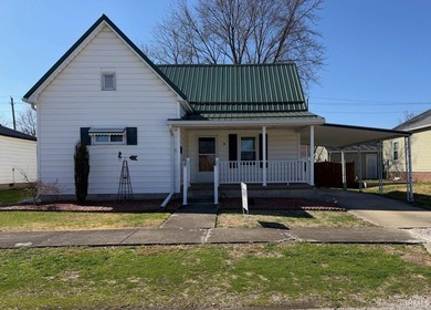 This charming 2-bedroom, 1-bath home has been lovingly