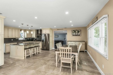 Expanded home featuring a gourmet eat-in kitchen with center - photo 6
