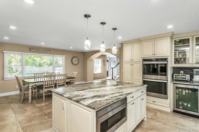 Expanded home featuring a gourmet eat-in kitchen with center - photo 9