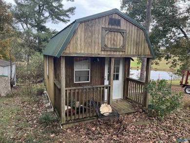 This is a very cozy three bed two bath on a very large lot