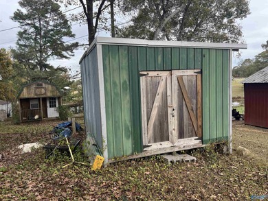 This is a very cozy three bed two bath on a very large lot