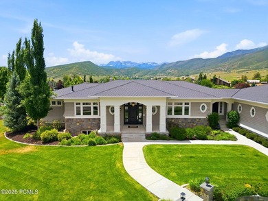 Set on 1.5 private acres with a Timpanogos view that's genuinely - photo 1