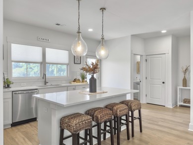 Welcome to 139 Sabal Court, a truly exceptional townhome in