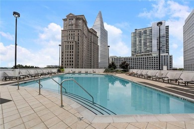 Perched on the 28th floor of Realm, this stunning one-bedroom