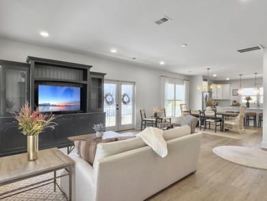 Welcome to 139 Sabal Court, a truly exceptional townhome in