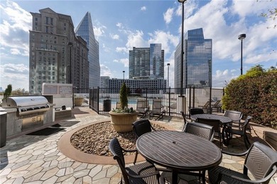 Perched on the 28th floor of Realm, this stunning one-bedroom