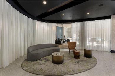 Perched on the 28th floor of Realm, this stunning one-bedroom