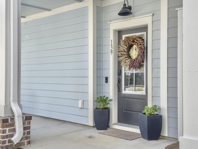 Welcome to 139 Sabal Court, a truly exceptional townhome in