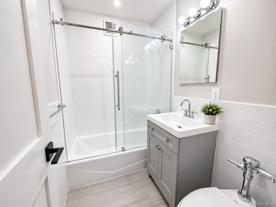 Welcome to this fully gut-renovated 1-bedroom co-op in the heart - photo 4
