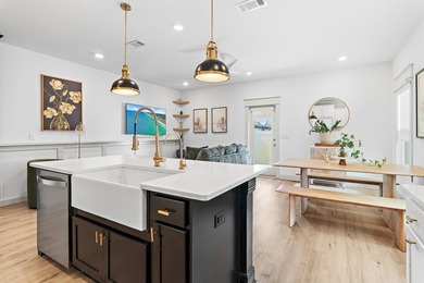 Experience coastal living at its finest in this beautifully - photo 3