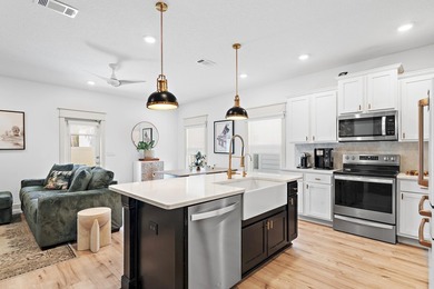 Experience coastal living at its finest in this beautifully - photo 6