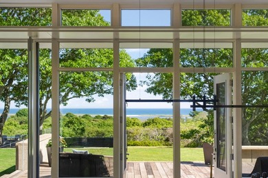 Horizon House sits atop one of Chilmark's most private and - photo 9