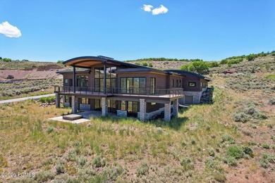Set in Tuhaye outside Park City, 9009 N Uinta Drive makes an - photo 2
