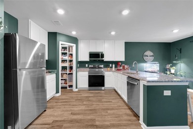 Built in 2023, this nearly new single-story home offers a - photo 4