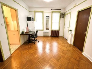 Welcome to 4215 Bedford Avenue, an extra-large two-family - photo 2