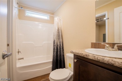 Take a tour to this 3-bedroom, 2-bathroom manufactured home - photo 22