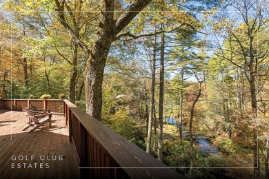 Set along the banks of the Horsepasture River, this exceptional - photo 4