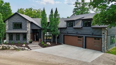 Rare opportunity on Pelican Lake! Built in 2020, this impressive - photo 2