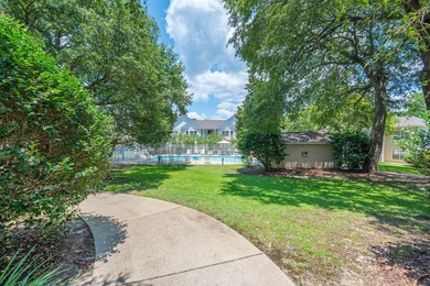 This charming first-floor 2-bedroom, 2-bath condo overlooks the - photo 3