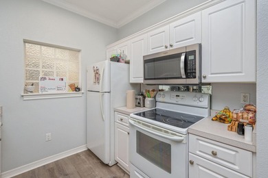 This charming first-floor 2-bedroom, 2-bath condo overlooks the - photo 9