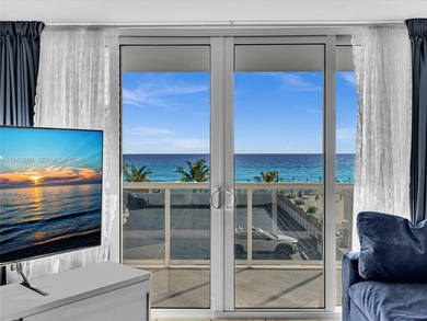 Oceanfront corner residence offering direct ocean views from the