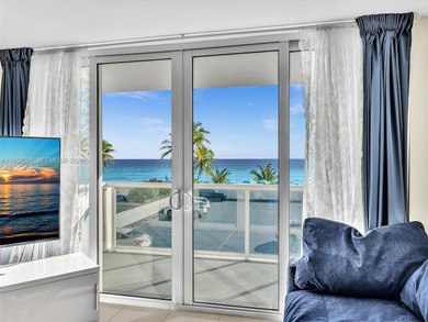 Oceanfront corner residence offering direct ocean views from the