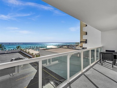 Oceanfront corner residence offering direct ocean views from the