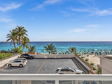 Oceanfront corner residence offering direct ocean views from the