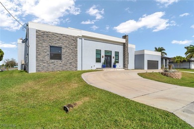 This stunning 3-bedroom, 3-bath contemporary Gulf access home