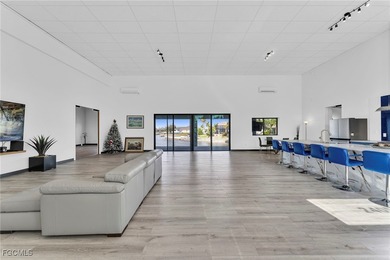 This stunning 3-bedroom, 3-bath contemporary Gulf access home