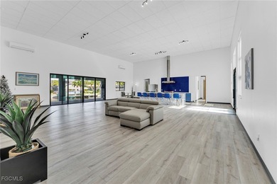 This stunning 3-bedroom, 3-bath contemporary Gulf access home