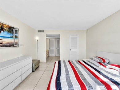 Oceanfront corner residence offering direct ocean views from the