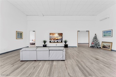 This stunning 3-bedroom, 3-bath contemporary Gulf access home