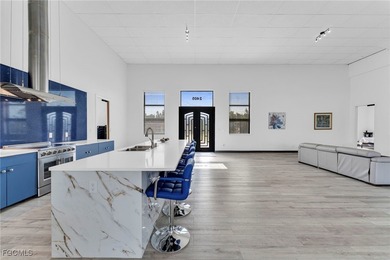 This stunning 3-bedroom, 3-bath contemporary Gulf access home