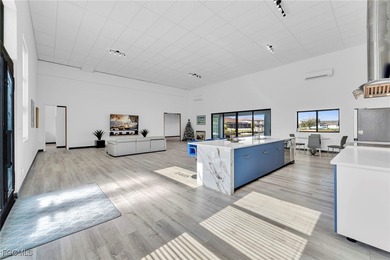 This stunning 3-bedroom, 3-bath contemporary Gulf access home