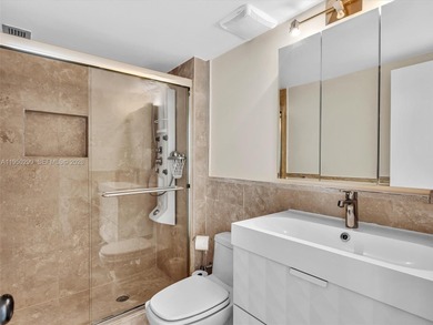 Oceanfront corner residence offering direct ocean views from the