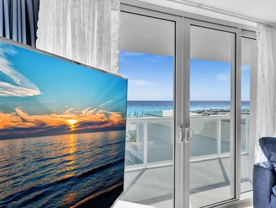 Oceanfront corner residence offering direct ocean views from the