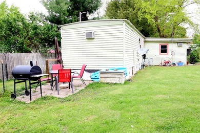 This charming, cozy mobile home sits on two spacious lots - photo 11