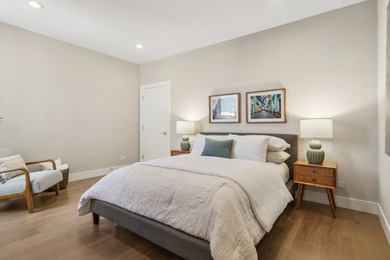 Welcome to refined urban living in this sun-drenched north/east