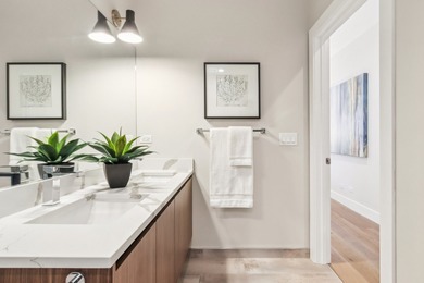 Welcome to refined urban living in this sun-drenched north/east