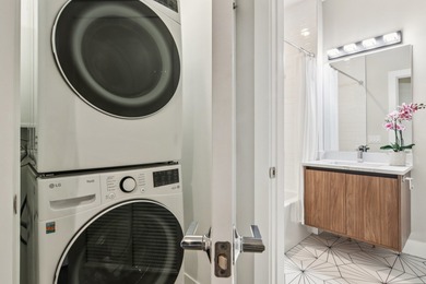 Welcome to refined urban living in this sun-drenched north/east