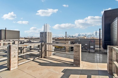 Welcome to refined urban living in this sun-drenched north/east